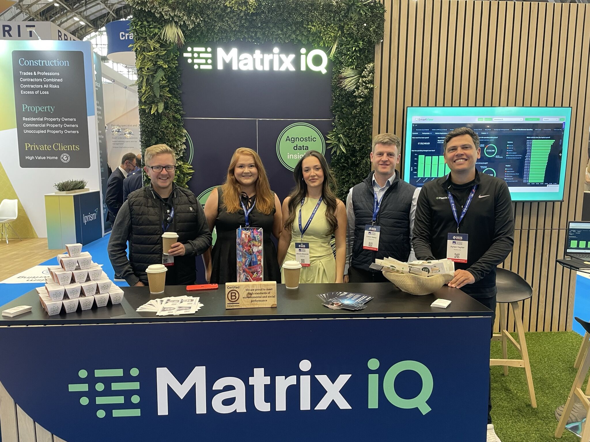 Matrix iQ team at a booth